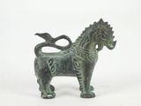 statue of a bronze horse with a long mane and a tail
