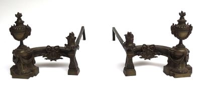 pair of antique bronze candlesticks with flowers and birds on them