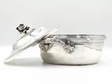 silver plated casserole with lid on white background
