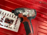 a red tool box with tools inside of it