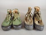 three pairs of shoes are lined up in a row on a table