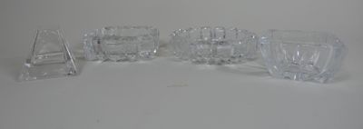five glasses sitting on a table with a white background