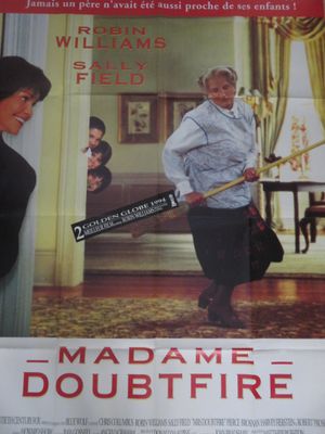 movie poster of a woman holding a broom in front of a man