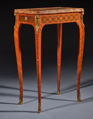 a small table with a marble top and a wooden base