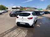 a lot of cars that are parked in a parking lot
