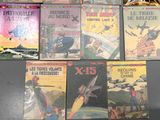 a lot of books that are on the table