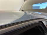 a close up of the hood of a car