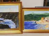 painting of a couple of paintings on a shelf next to each other