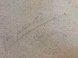 a close up of a piece of paper with writing on it