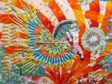 an image of a colorful scarf with a bird on it ' s back