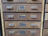 a lot of drawers that are stacked on top of each other