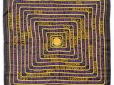 a purple and yellow square scarf with words on it