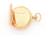 an image of a close up of a gold pocket watch