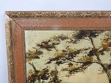 an image of a painting of a tree in a frame on a wall