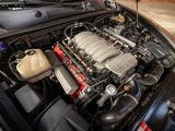 a car engine with the hood open in a garage