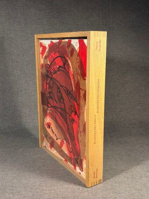 an image of a wooden box with a painting on it