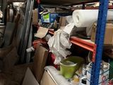 a lot of boxes and other items on the shelves