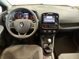 the interior of a car with a steering wheel, dashboard, and dashboard controls