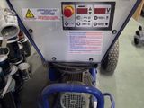 a machine that is sitting on the floor in a room
