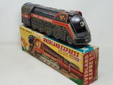 a toy train sitting on top of a box on a table