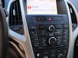 the interior of a car with a dashboard and steering wheel