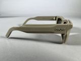 the sunglasses are made of plastic and have a brown frame