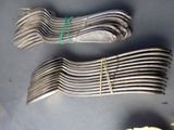 a lot of forks that are on a table