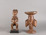 paire de figurines africaines sculptées dans le bois représentant une femme et un homme