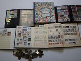 a lot of stamps and a book on the table