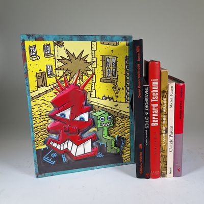 two books that are sitting next to each other on a table