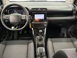 the interior of a car with a steering wheel, dashboard, and dash board