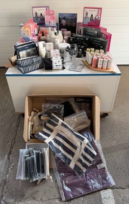 a box full of items that are sitting on the floor