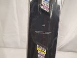 a snowboard that is in a package on a white surface