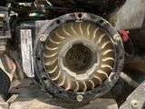 an image of a close up of a blower motor on a table