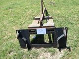 a small machine that is sitting in the grass