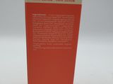 a box of hair serum sitting on top of a white table