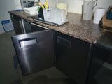 a dishwasher in the middle of a kitchen counter