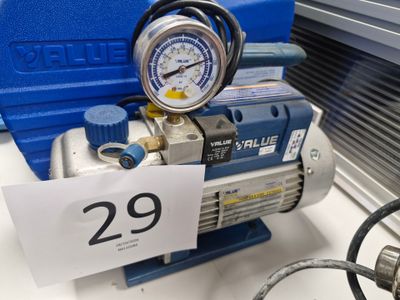 une image représentant un compresseur surmonté d'un manomètre