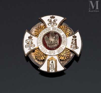 an image of a badge with a crown on it