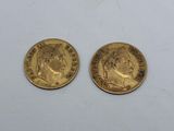 two gold sovereigns, one with the head of a man and one with a woman
