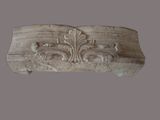 a close up of a decorative object on a gray background