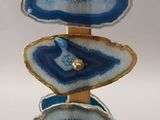 a picture of a stack of blue and white agate