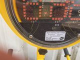 a close up of a parking meter with red numbers on it