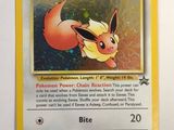 a close up of a pokemon card on a white surface