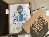 a box with a picture of a football player inside of it