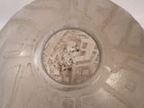 a close up of a glass vase with a hole in it