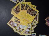 a lot of cards on the table with a lot of them