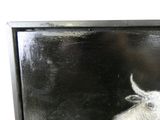a painting of a goat that is on the wall