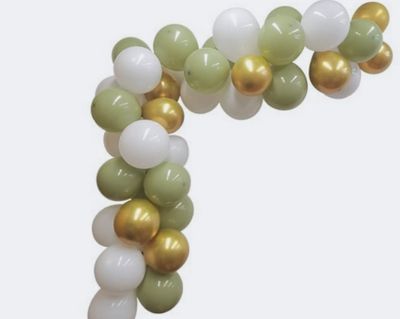 a balloon arch made of green, white and gold balloons