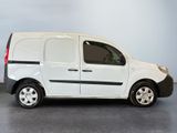 a picture of a white van parked in a garage